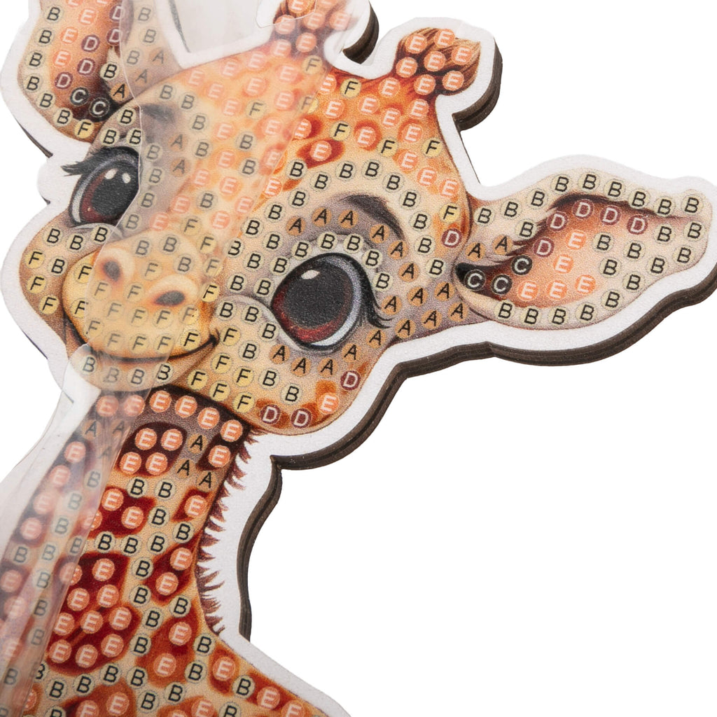 close up view of Giraffe Crystal Art Wildlife Buddy, showing coded adhesive template for placement of crystals