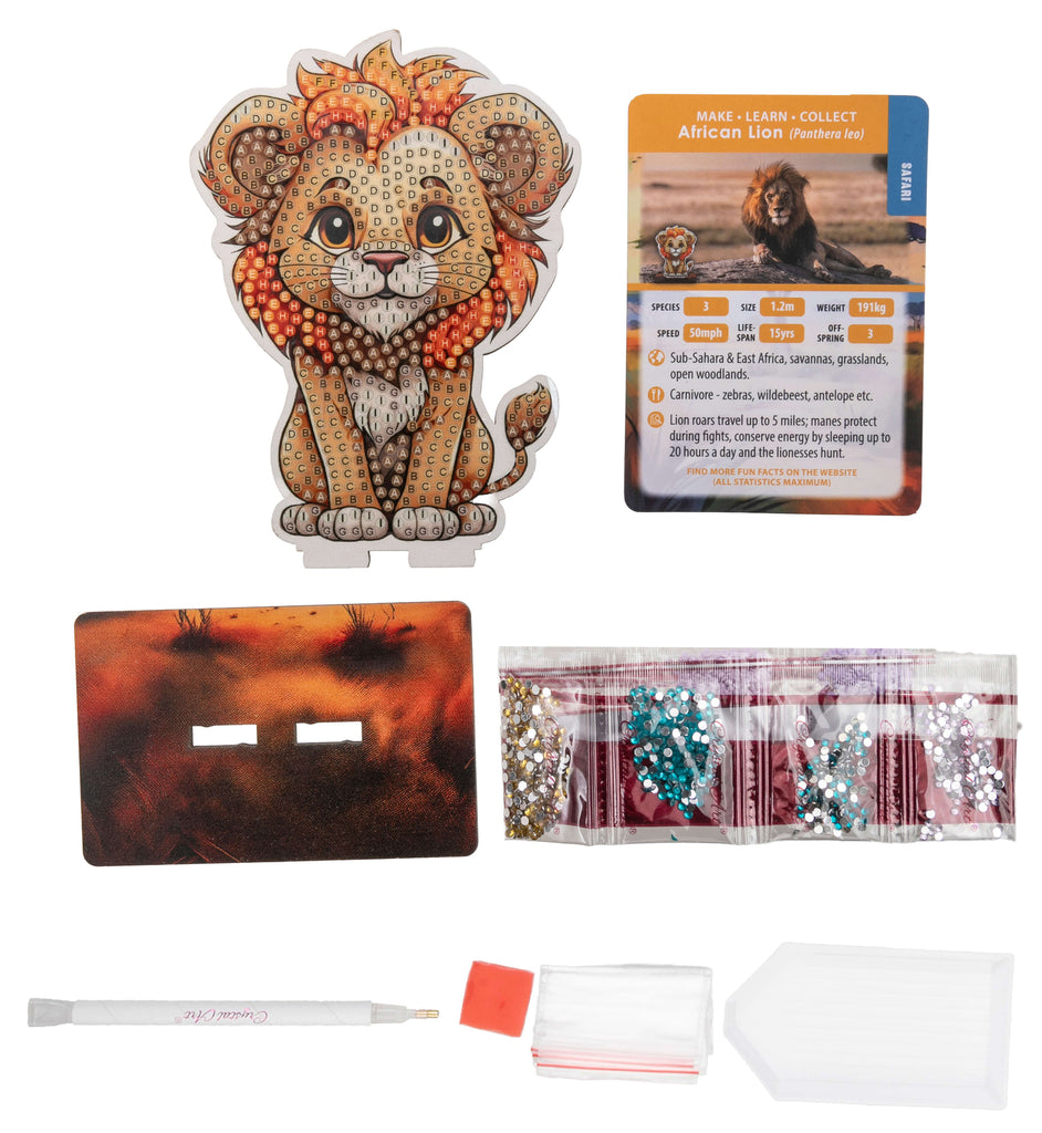 Lion Crystal Art Wildlife Buddy diamond painting kit contents, including adhesive template and base, crystals, tools and lion information card