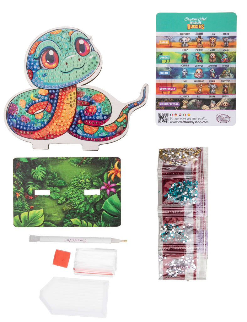 Snake Crystal Art Wildlife Buddy diamond painting kit contents, including adhesive template, base, crystals, tools and snake information card