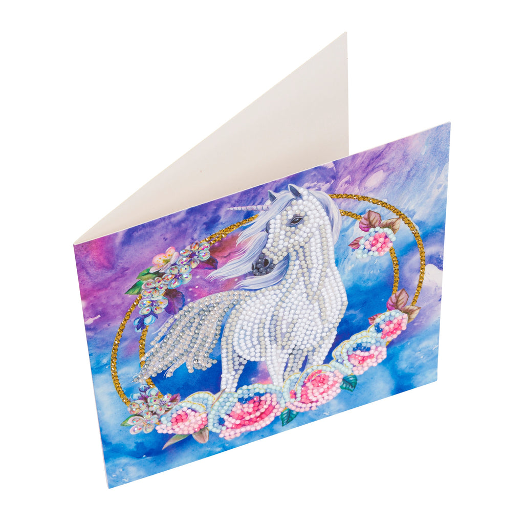 side view of Unicorn Garland Crystal Art greetings card, slightly open to show left blank inside for own message