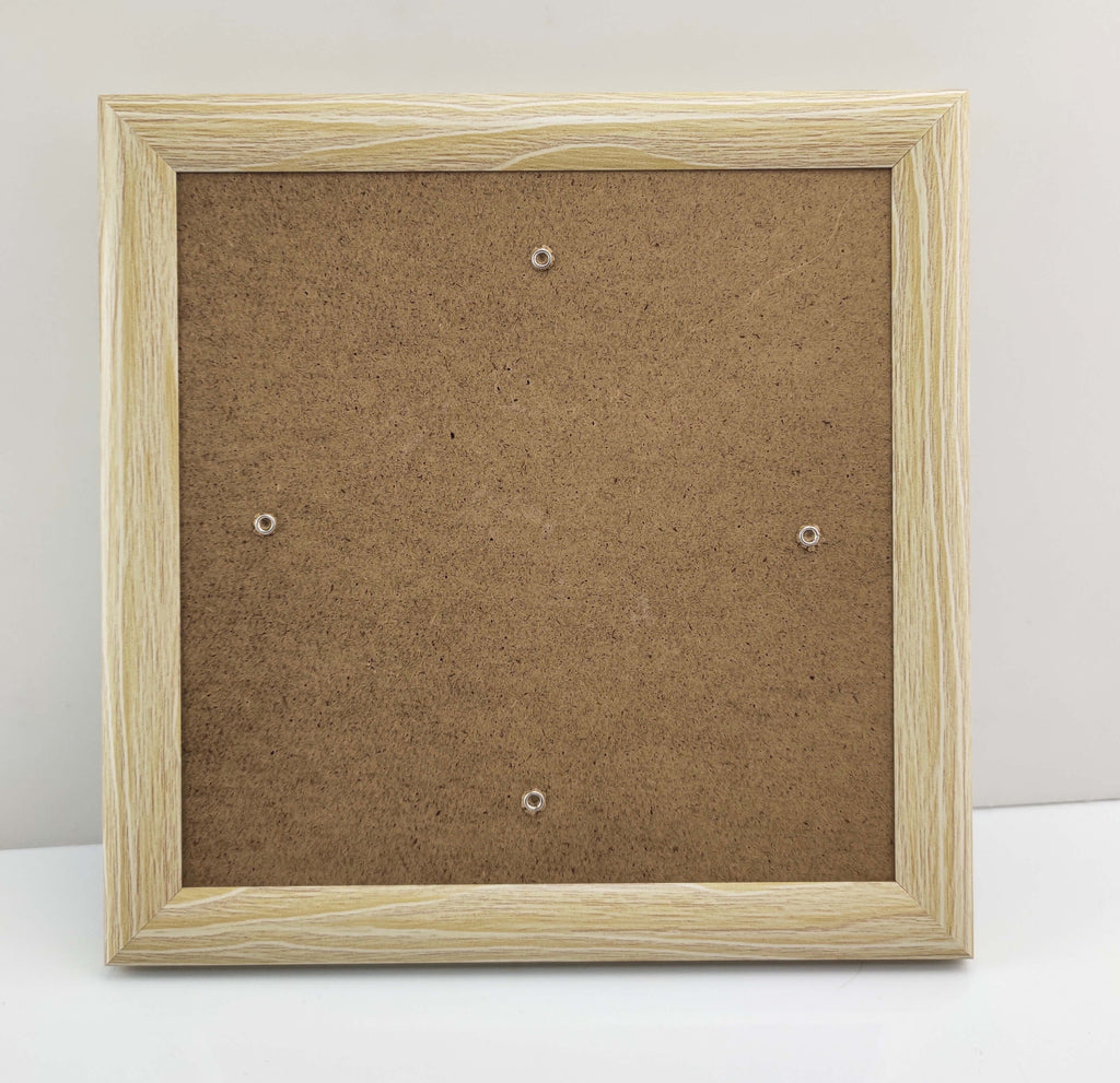 Wood-effect Craft Buddy Greetings Card Frame, photographed on table against white background