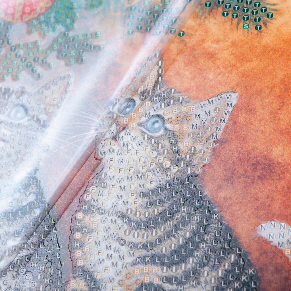close up view of Magic of Christmas Crystal Art greetings card, showing coded adhesive template for building up the image