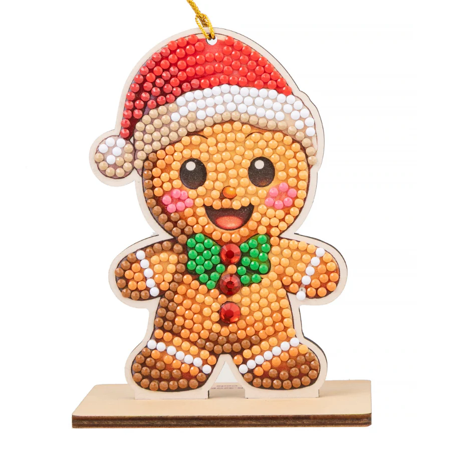 completed Gingebread Man Crystal Art Christmas Buddy, featuring smiling gingerbread man wearing festive green bowtie and santa hat