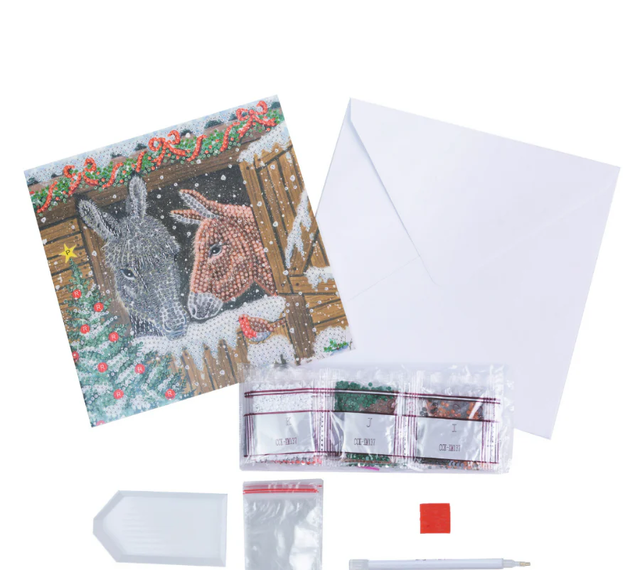 Craft Buddy Winter Donkeys Crystal Art Greetings Card Kit contents, including envelope, coded crystals and tools